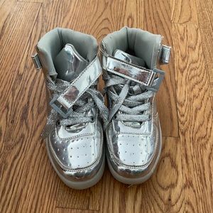 Light up silver sneakers.  No charger